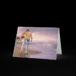 Couple in Love Walking on Beach into the Sunset Greeting Cards