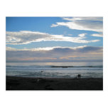 Couple on Beach Gazing into Sunset and Ocean Post Cards