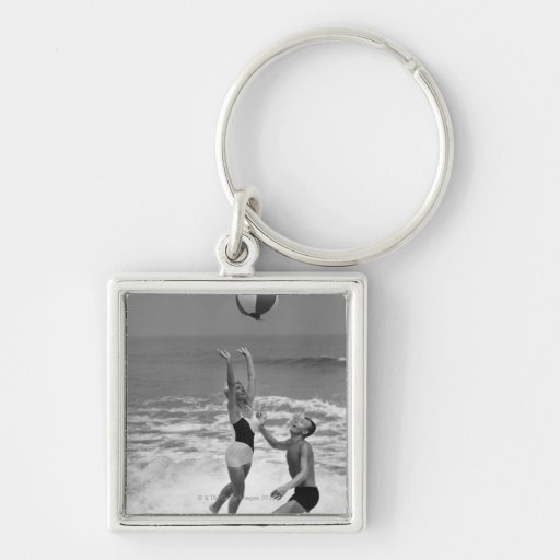 Couple Playing with a Beachball Keychains