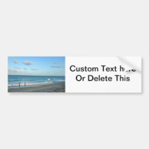 Couple walking on florida beach w seagull bumper stickers