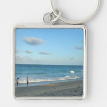 Couple walking on florida beach w seagull keychains
