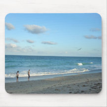 Couple walking on florida beach w seagull mousepad