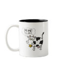 twotone_mug - A cute cow, complete with udder and cowbell shouts out Eat Me!  Im Juicy.  Cows love to be eaten.  Juicy, tasty meat containers that they are.  MMMmmmmm.: Sizes  Available colors: black
