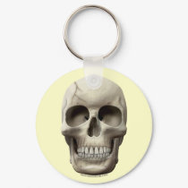 Cracked Skull keychains by thefrozenduck Cracked Skull keychains