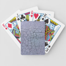 Cracks in asphalt pavement of walkway bicycle poker deck