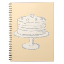 Cream Color Cake on Beige Background. Spiral Note Book