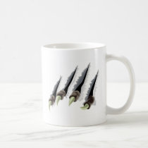 Creature claws tearing through background mug