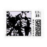 Creepy Black tree limbs postage