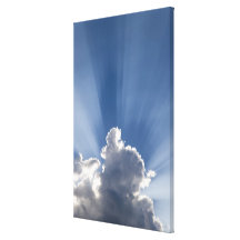 Crepuscular or God's rays streak past cloud. Gallery Wrapped Canvas
