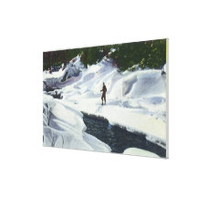 Cross-Country Skier Pauses by Mountain Brook Canvas Prints