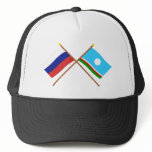 Crossed flags of Russia and Sakha Republic hats