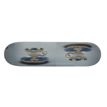 Cup and saucer with colorful designs skate board deck