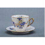Cup and saucer with colorful flower designs photo sculptures