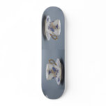 Cup and saucer with colorful flower designs skate board decks