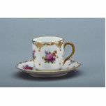 Cup and saucer with colorful flowers on it. photo cutout