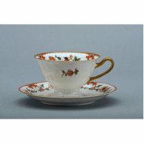 Cup and saucer with colorful flowers on it. acrylic cut out