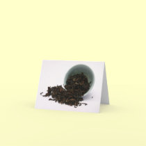 Cup with dry tea leaves Notecard cards