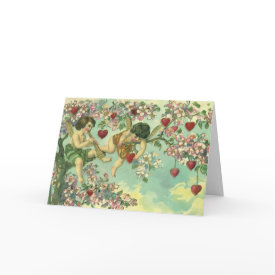 Cupids on a Heart Tree Card - Vintage illustration Valentine's Day design featuring two cupids sitting in a tree with flowers and hearts, one is playing a musical instrument.