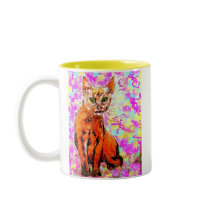 curious cat  yellow mugs