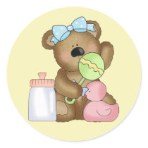 Cute Baby Girl Bear with Baby Bottle and Rattle. Round Sticker