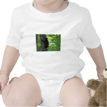Cute Black Bear Cub Climbing On The Tree In Forest Tees