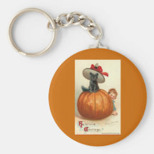 cute black cat in witches's hat key chains