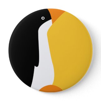Cute emperor penguin on a button for fashion flair