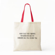 Cute, "Face Towards the Sunshine" quote Bags