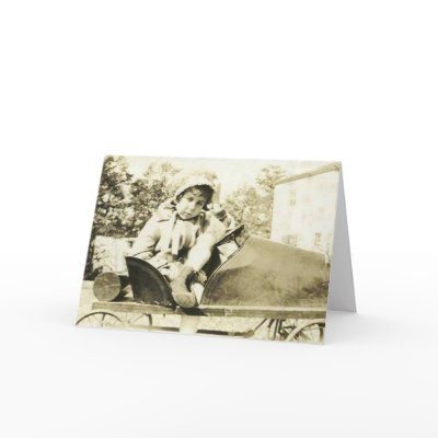 Cute girl in a peddle car greeting card by amazingvintage