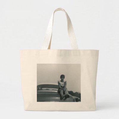 cute girl sitting on back of old car bag by amazingvintage