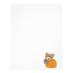 cute halloween teddy bear in pumpkin boo letterhead
