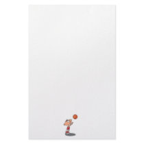 cute little boy shooting a basketball stationery