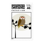 Cute owl on the tree postage