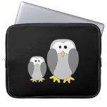 Cute Penguins. Cartoon on Black Background. Computer Sleeve