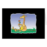 cute sitting giraffe with flowre greeting card