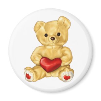 Cute Teddy holding a heart magnet