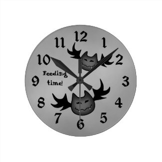 Cute vampire bat Halloween funny feeding time Clock