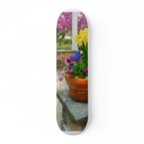 Daffodils and Pansies in Flowerpot skateboards