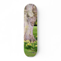 Daffodils Around The Tree In The Park skateboards