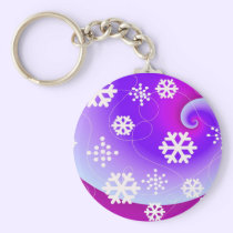 Dancing Snowflakes on a Purple Swirl Background keychains