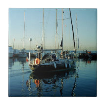 Dark Blue Sloop Leaving Harbor Ceramic Tile
