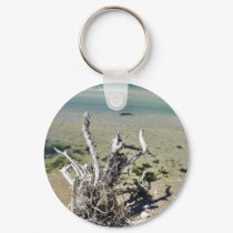 Dead Dry Tree On The Beach In Albania keychains by lifesphere Dead Dry Tree On The Beach In Albania keychains