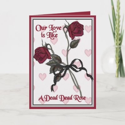 Two dead red roses. An anti valentine's day card or gothic design for 