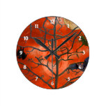 Dead Tree amongst an Orange Scary Sky Wall Clock