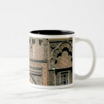 Decorative scheme above the doorway mug