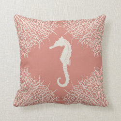 Decorative throw pillow with seahorse and coral