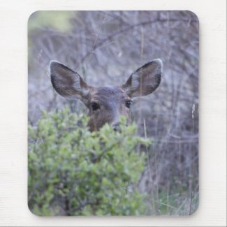 Deer hiding in bushes mousepad