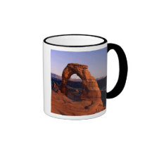 Delicate Arch at Sunset with snow covered La Mug