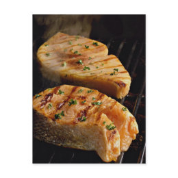 Delicious Salmon steaks on grill postcard