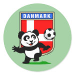 This adorable little panda is too cute! He's featured in front of a large flag from Denmark and ready to play football and score some goals. This cute design is perfect for football players and soccer fans.
